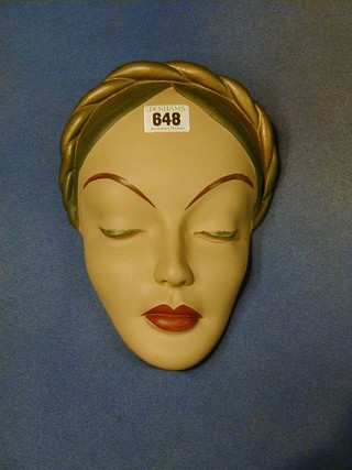 An Art Deco plaster mask the back marked Leorades impressed 288 10"