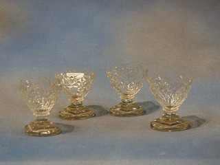 4 "Charles II" cut glass salts raised on oval bases