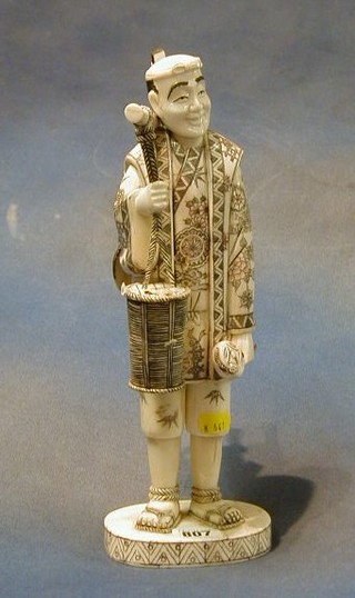 An ivory figure "The Mask Seller" 14" 