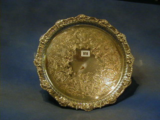 A circular silver plated salver, engraved and  with cast and pierced borders 14"