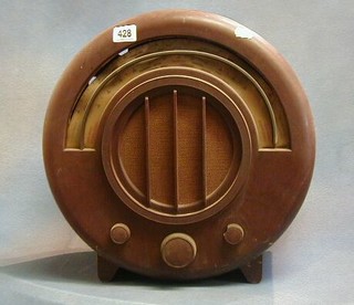 An Art Deco Ekco  AD65 radio contained in a round Bakelite case