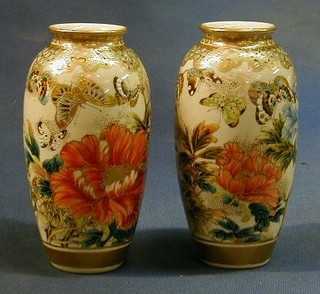 A pair of 19th Century fine quality Japanese Satsuma porcelain vases decorated butterflies amidst flowering branches, the base  with character mark and also impressed mark 6"