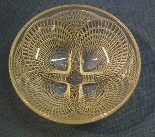 A circular Lalique glass bowl, the base marked R Lalique France no. 3204 with scallop shell decoration 4"