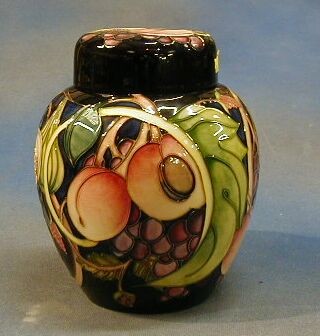 A 2000 Moorcroft ginger jar and cover in the Queens Choice design by Emma Bossons, the base impressed Moorcroft England Stoke on Trent, incised RL and marked WM2000 9"