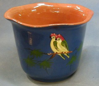 A  circular Royal Torquay pottery jardiniere decorated parrots 9"