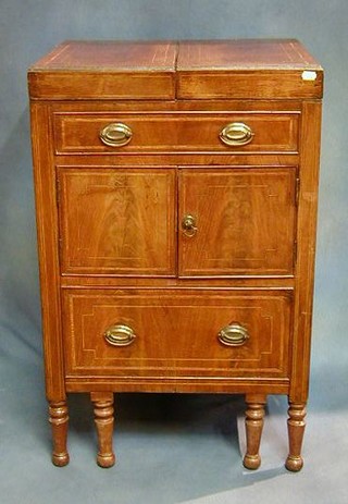 A Georgian mahogany enclosed wash stand fitted a drawer above a double cupboard with bidet drawer, raised on shaped supports 21"