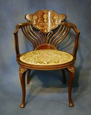 A late Victorian mahogany pierced tub back open arm chair inlaid an urn with fruit on cabriole supports