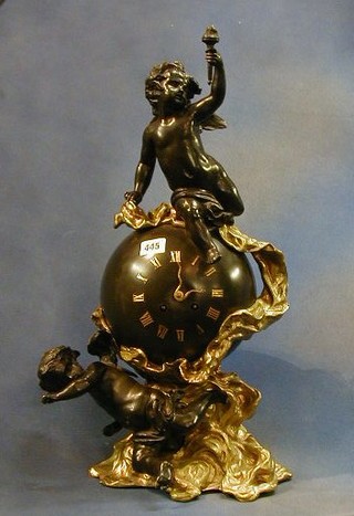 A fine quality 19th Century French 8 day striking mantel clock in the form of a bronze globe, surmounted by a figure of a seated cherub 22"