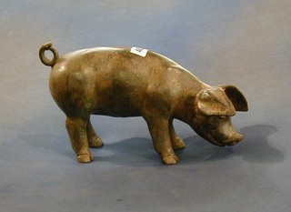 A bronze figure of a standing pig 8"