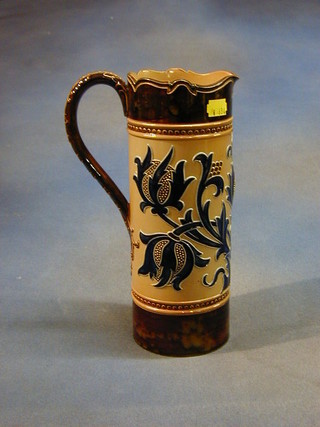 An Art Nouveau Doulton Lambeth stoneware jug, the base impressed Doulton Lambeth TTT Art Union London 633 and incised LB 10"