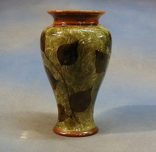 A Royal Doulton stoneware jug decorated leaves, the base impressed Royal Doulton 7560ff, 9"