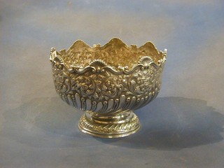 An Edwardian embossed silver pedestal punch bowl raised on a circular base, Birmingham 1902 79 ozs