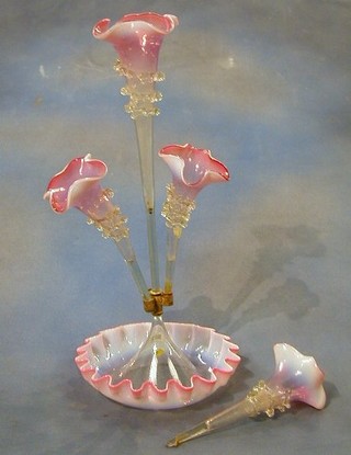 A 19th Century pink glass epergne/table centre piece with 5 trumpet flutes (f)