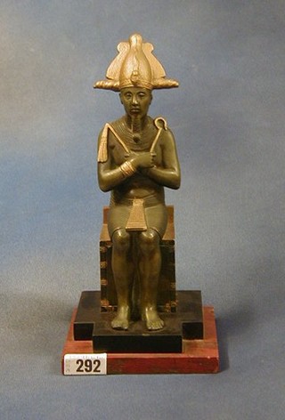 A bronze figure of a seated Pharaoh 11"