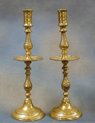 A pair of 17th Century style brass candlesticks 15"