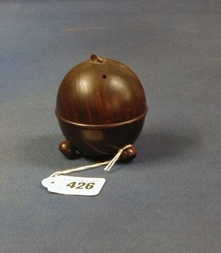 A Victorian turned wooden string box in the form of an apple raised on bun feet 3"