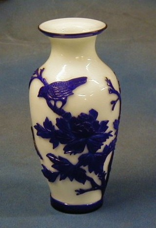 A white "Peking" glove vase with blue overlay decoration 8"