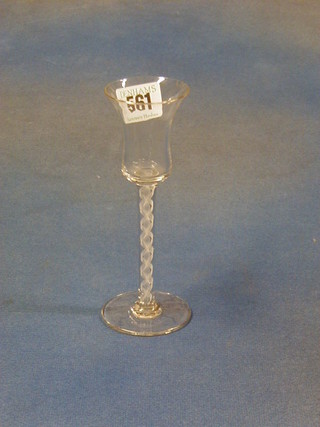 An 18th Century ale glass with bell shaped bowl and cotton twist stem (slight chip to bowl)