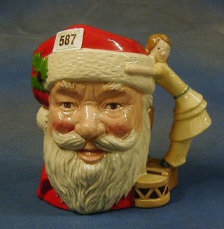 A large Royal Doulton character jug, Santa Claus with doll handle, the base marked D6668