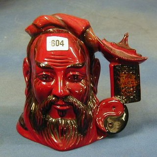 A Royal Doulton flambe character jug, Confucius, limited edition no 973, complete with certificate