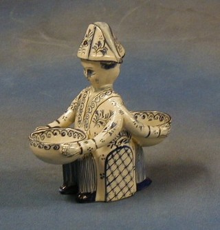 A Delft pottery table salt in the form of a 2 standing gentleman 6"