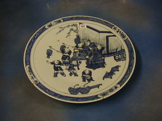 An 18th/19th Century Oriental blue and white charger decorated court figures 19"