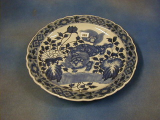 An antique Oriental porcelain blue and white plate decorated a dragon 16"