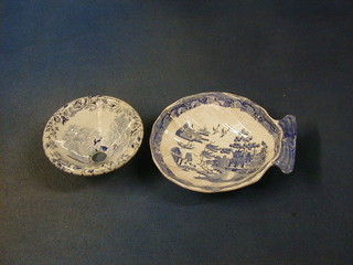 A blue and white pottery funnel 4" (cracked) and a 19th Century blue and white Willow pattern pottery scalloped shaped nut dish 6"