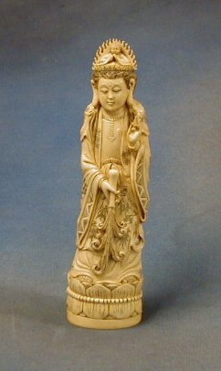 A 19th Century Japanese carved ivory figure of a standing Deity 10", base signed with seal mark  