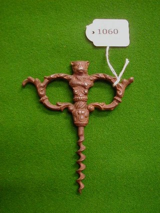 A 19th Century iron cork screw decorated a cat,