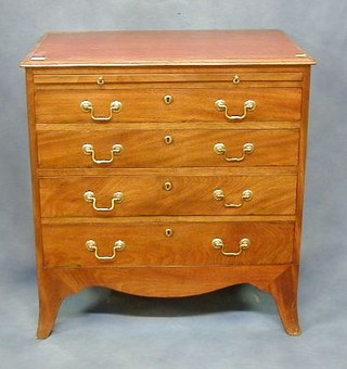 A Georgian mahogany chest of 4 long drawers with brass swan neck handles and fitted a brushing slide, raised on splayed bracket feet