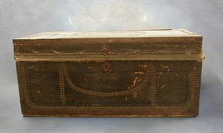 A 19th Century leather, brass banded and studded travelling trunk with hinged lid 29"