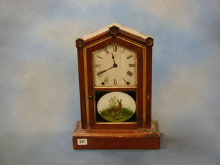 A 19th Century American 8 day striking shelf clock, the door panel painted a hare