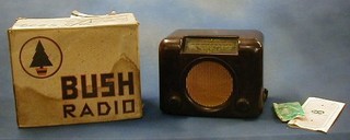 A 1950/60's Bush brown Bakelite radio in original cardboard carton