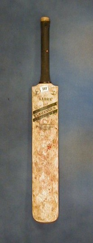 A Sabre Slazenger short handled cricket bat