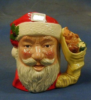 A large Royal Doulton character jug, Santa Claus with toy stack handle, the base marked Santa Claus D6690