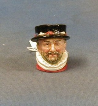 A miniature Royal Doulton character jug Beefeater