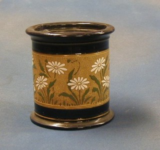 A Doulton style circular tobacco jar, the base marked Ugly Mill England