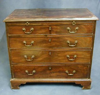 A Georgian mahogany chest of 4 long drawers with brushing slide raised on bracket feet 34"