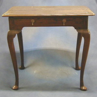 An early 18th Century oak side table fitted a drawer raised on cabriole supports 31"