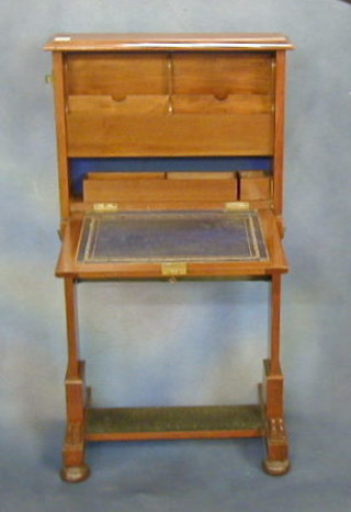 A Victorian mahogany campaign desk with figured walnutwood panel 23" 