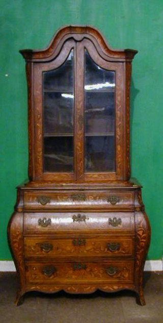 A fine quality 18th Century Dutch inlaid marquetry cabinet on chest with moulded cornice, the interior fitted adjustable shelves enclosed by glazed panelled doors, the base of bombe form fitted 4 long drawers, raised on cabriole supports 54"