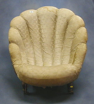 A Victorian mahogany framed scallop shaped nursing chair