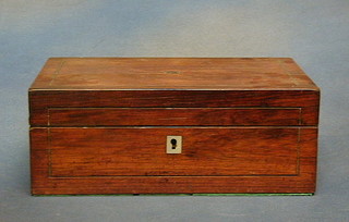 A Victorian mahogany rectangular trinket box with hinged lid 10"