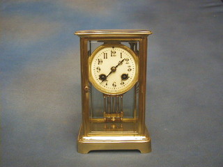 A 19th Century French gilt metal 4 glass clock with twin mercury pillar and enamelled dial