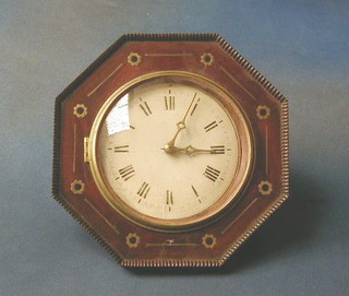 A 19th Century Postman's alarm clock, the 6" circular painted dial with brass hands, contained in a mahogany and inlaid brass octagonal case