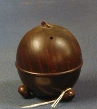 A Victorian turned wooden string box in the form of an apple raised on bun feet 3"