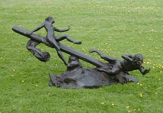 R. Rozet, a large  bronze figure group of a naked lady and faun on a seesaw, 57"