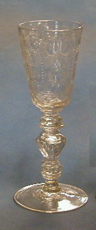 A large and impressive 18th/19th Century cut glass goblet with faceted stem raised on a circular foot, 10"