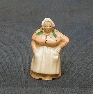 A Victorian Royal Worcester porcelain candle snuffer in the form of a standing house keeper, 3", the interior with green Royal  Worcester mark